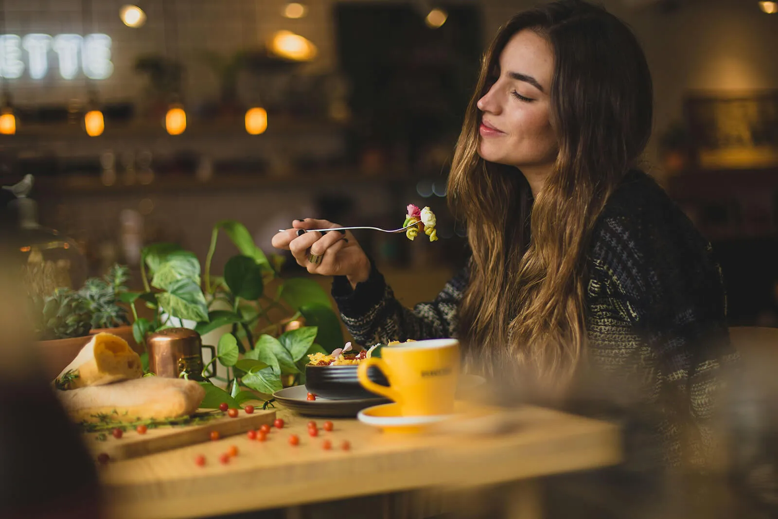 A woman enjoying her delicious food